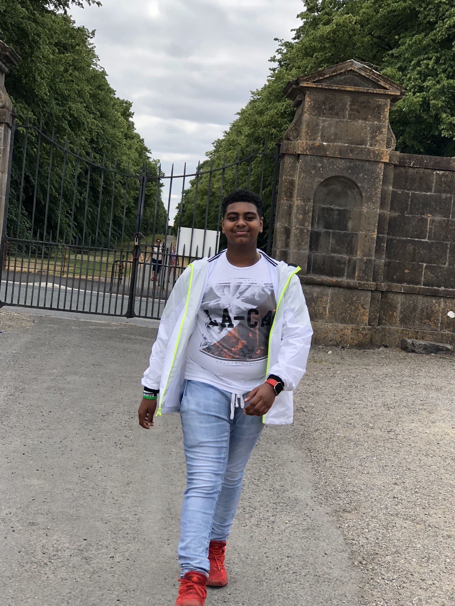 Henos by a gate