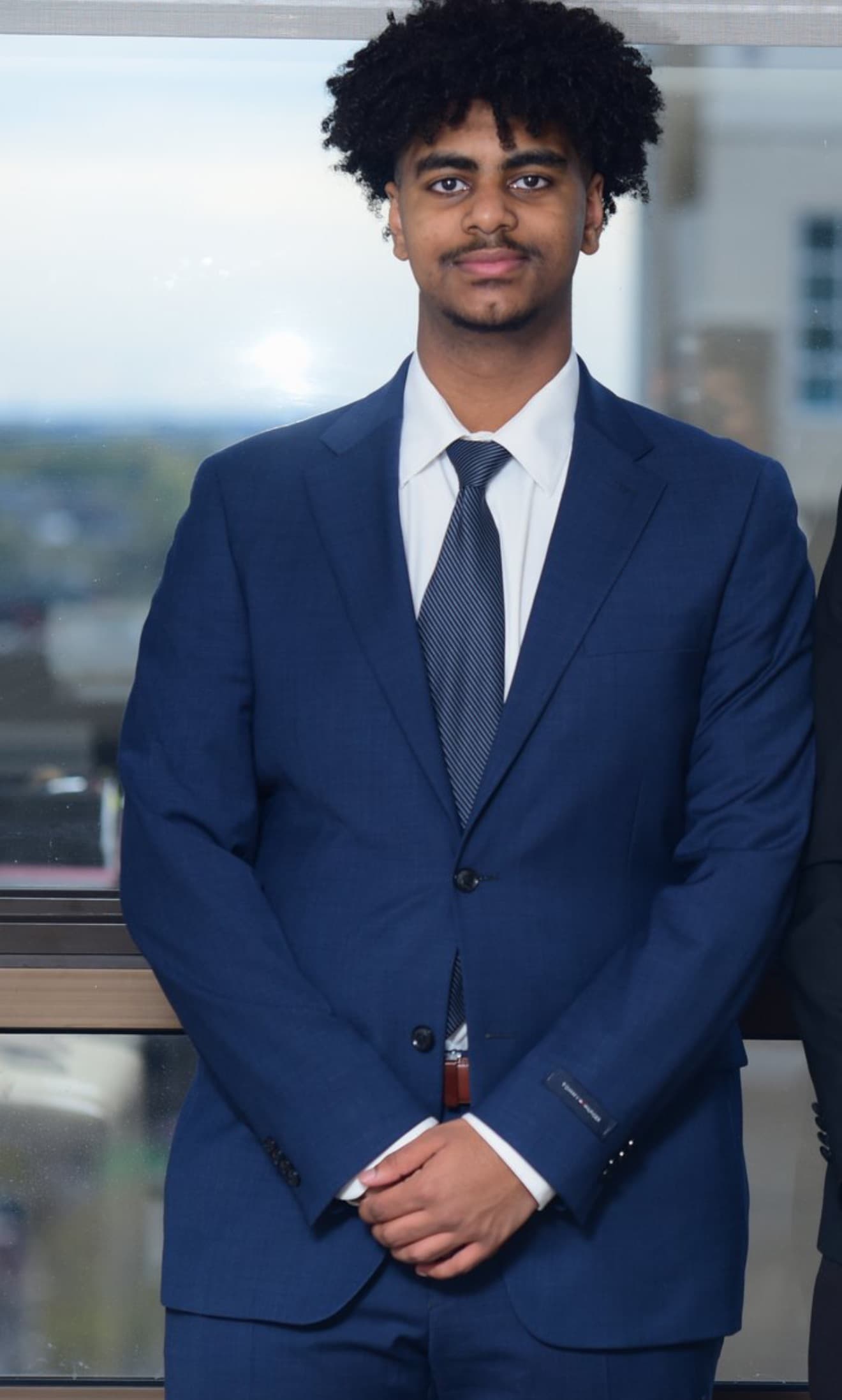 Henos in a suit